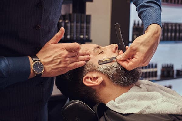 لوگوی آرایشگاه مردانه رز سیاه | سالن کارا